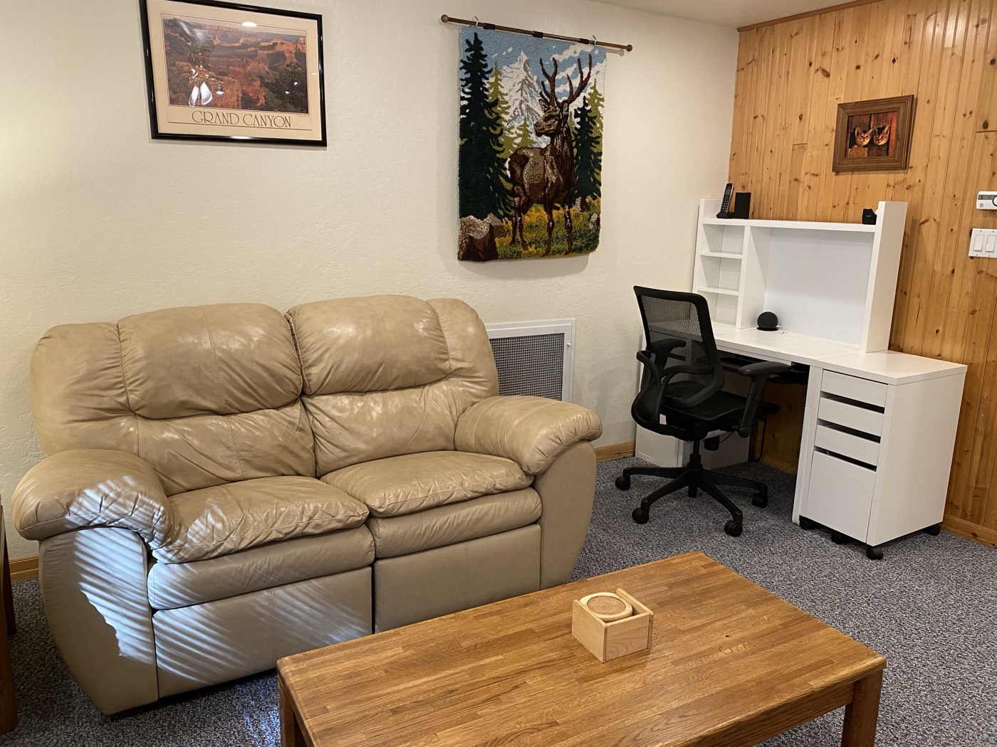 Upstairs game room desk and loveseat